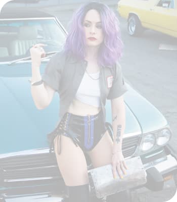 DJ Bright Lights seats on a car